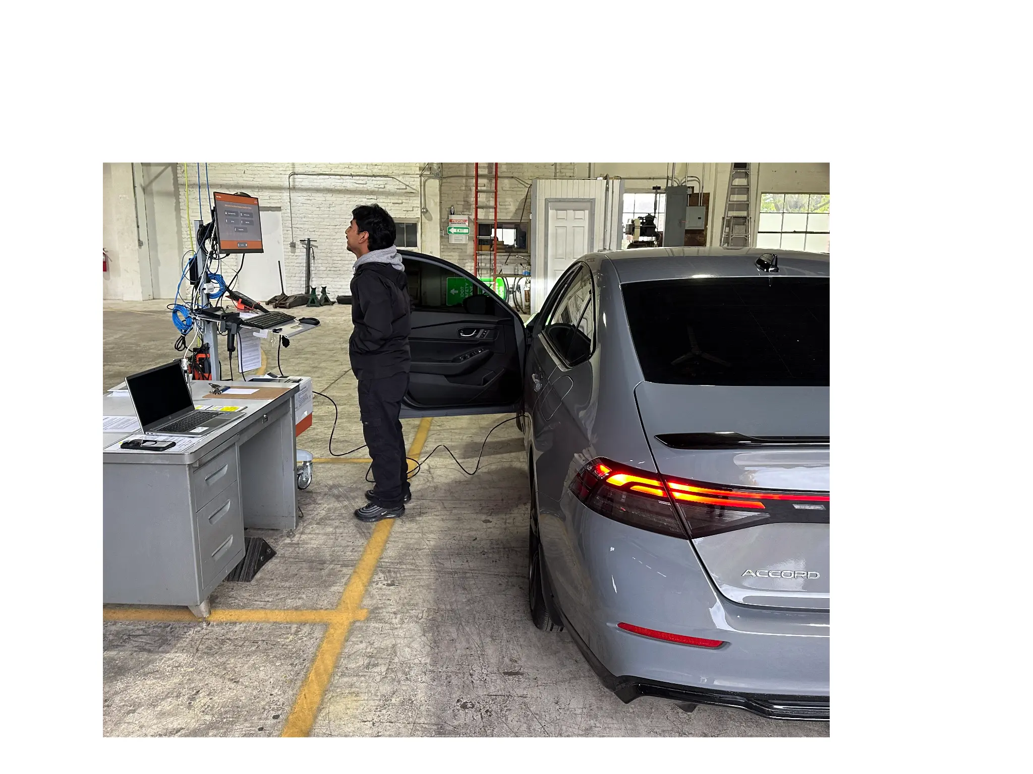 Vehicle emissions testing lane at Waukesha Emissions Testing Station in Waukesha, Wisconsin